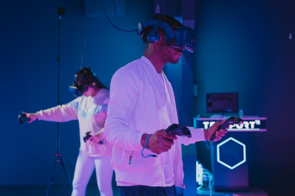 man playing a video game while wearing a vr headset