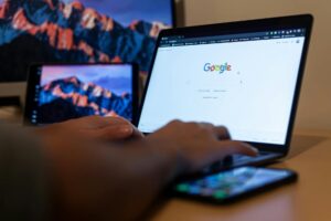 close up shot of a person using a laptop