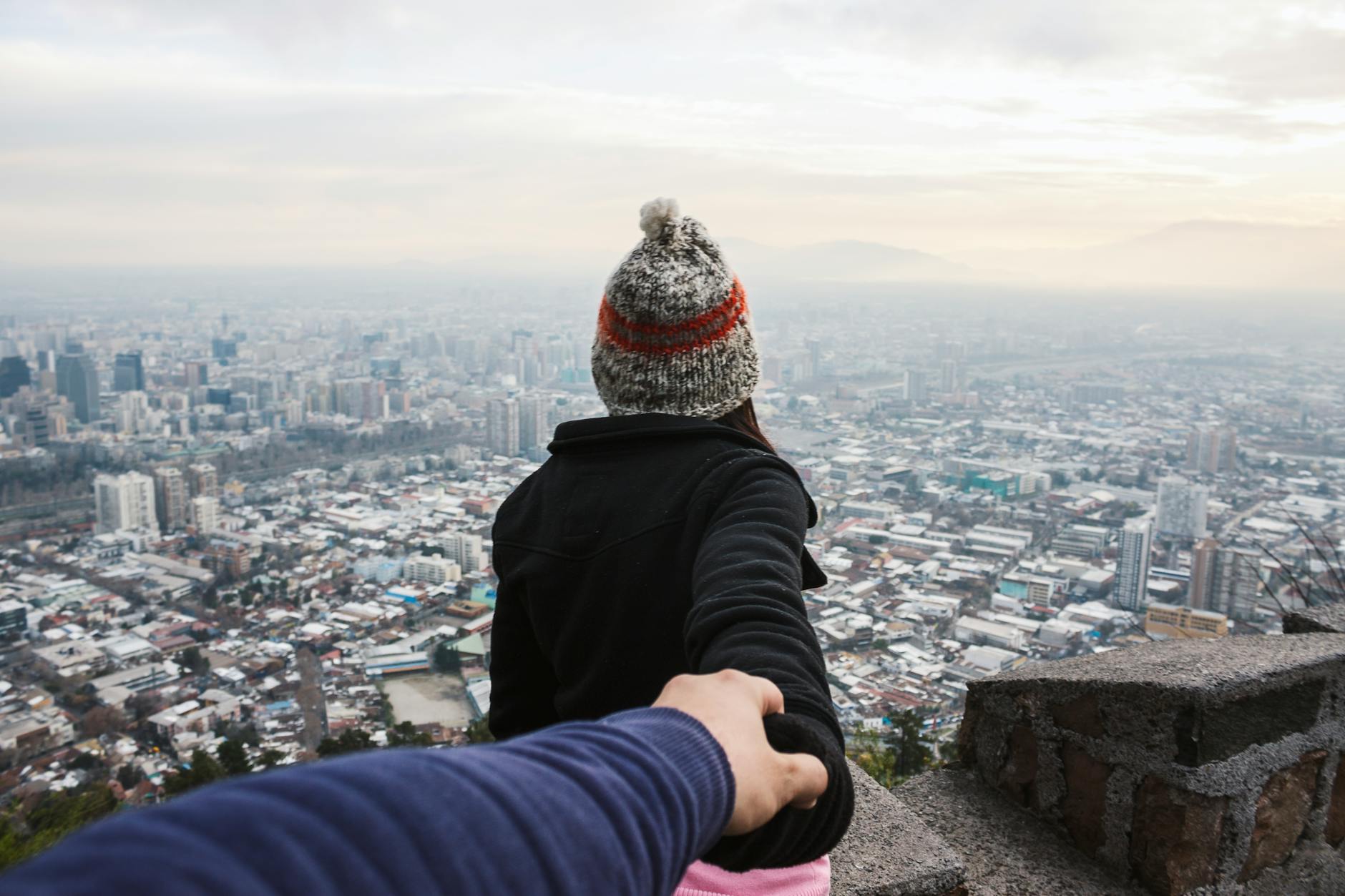 man and woman holding hands