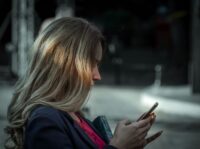 woman using her smartphone