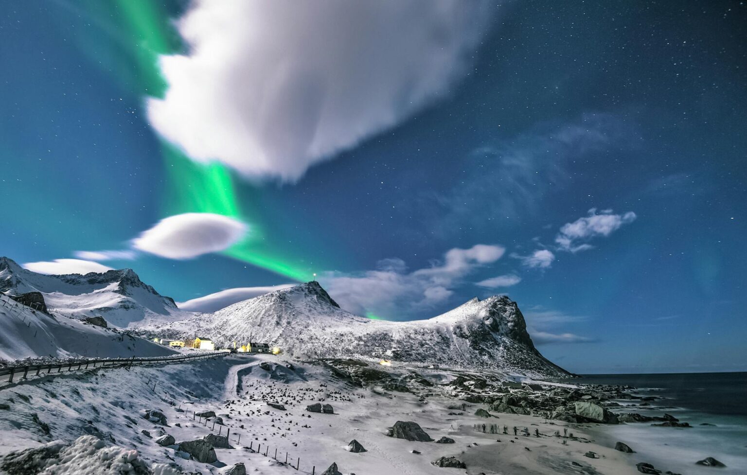 scenic view of snow capped mountains during night