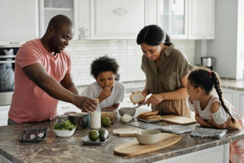 family making breakfast in the kitchen