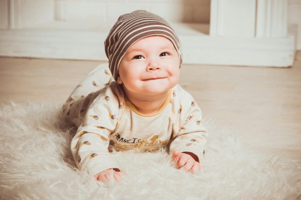 baby on fur rug