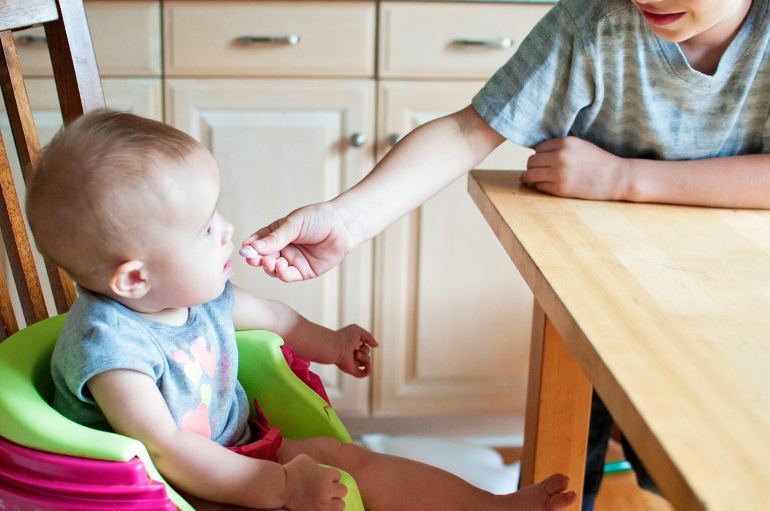 baby s green and purple highchair