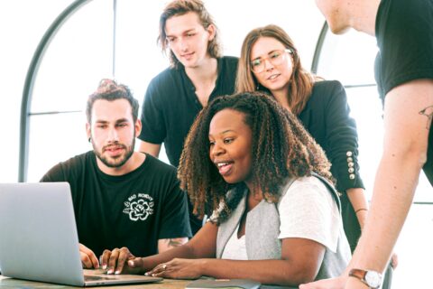 woman sharing her presentation with her colleagues