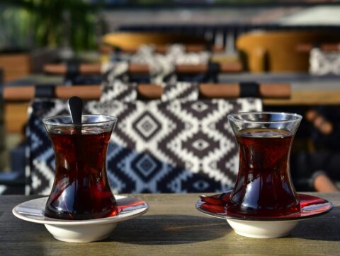 close up of turkish tea in glasses on a table in a cafe