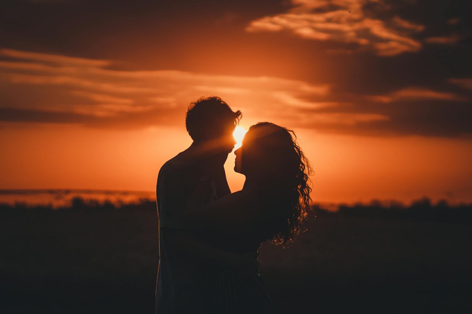 silhouette photography of man and woman