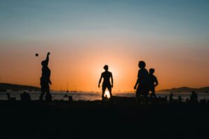 silhouetted beach games at vancouver sunset