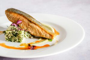 salmon dish on a ceramic plate