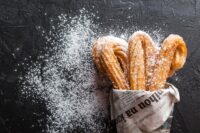 churros with powdered sugar